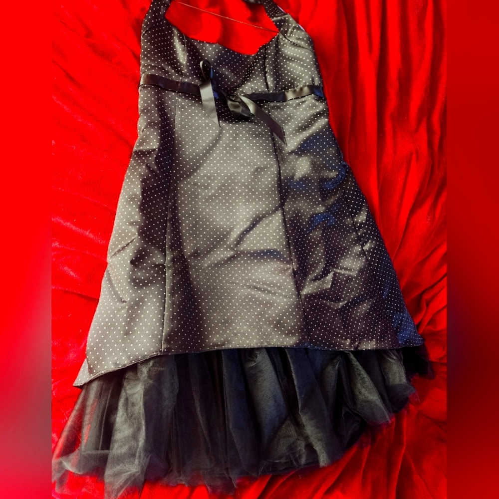 Black and white polka-dot party dress